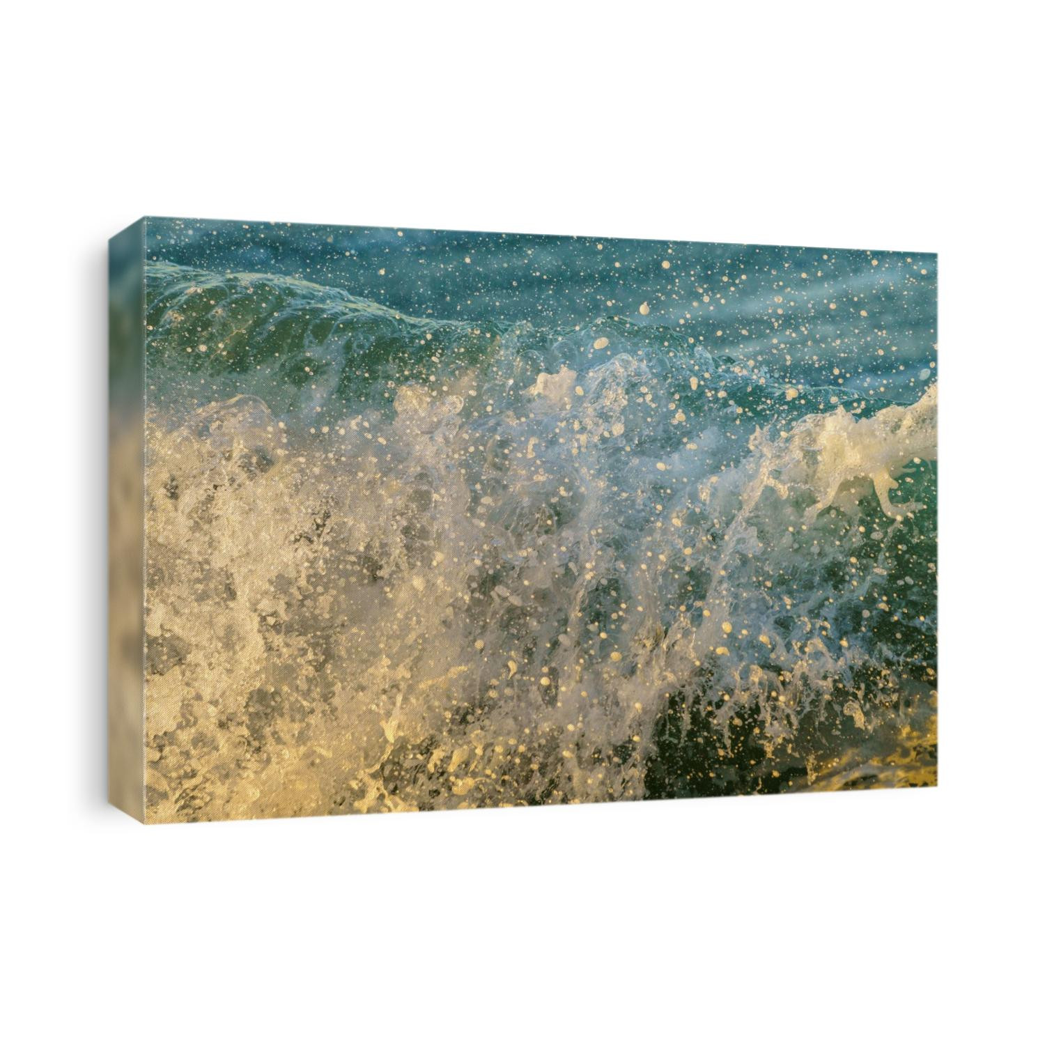 Just after the crest of a breaking wave, the sea spray can be electric