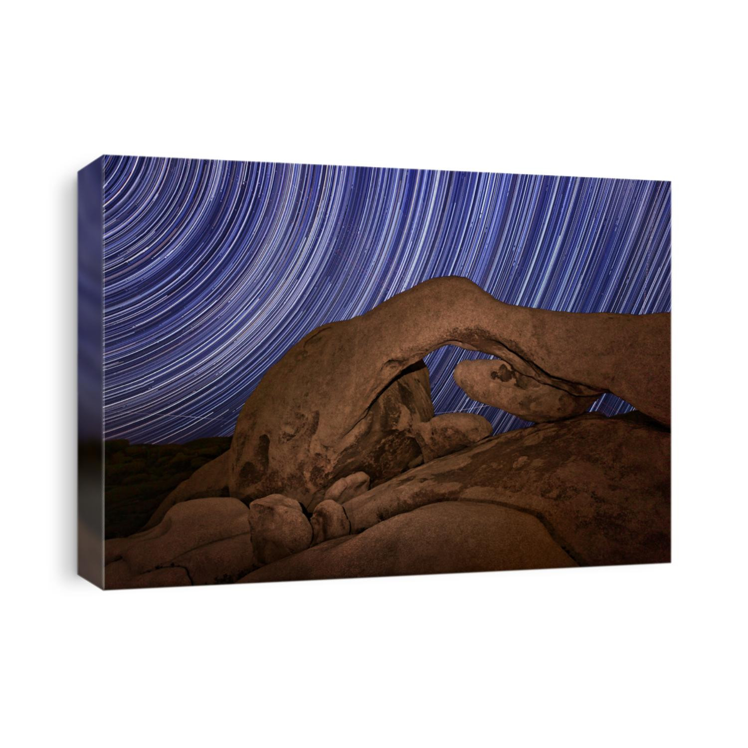Star Trail Streaks over the Rocks of Joshua Tree Park