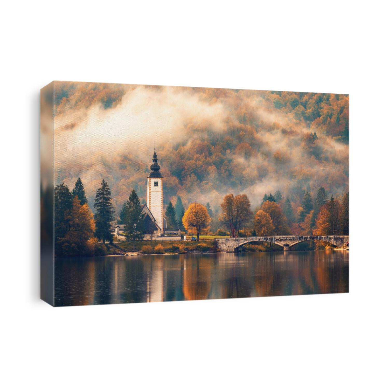 Foggy morning in autumn at Lake Bohinj In National Park Triglav, Slovenia