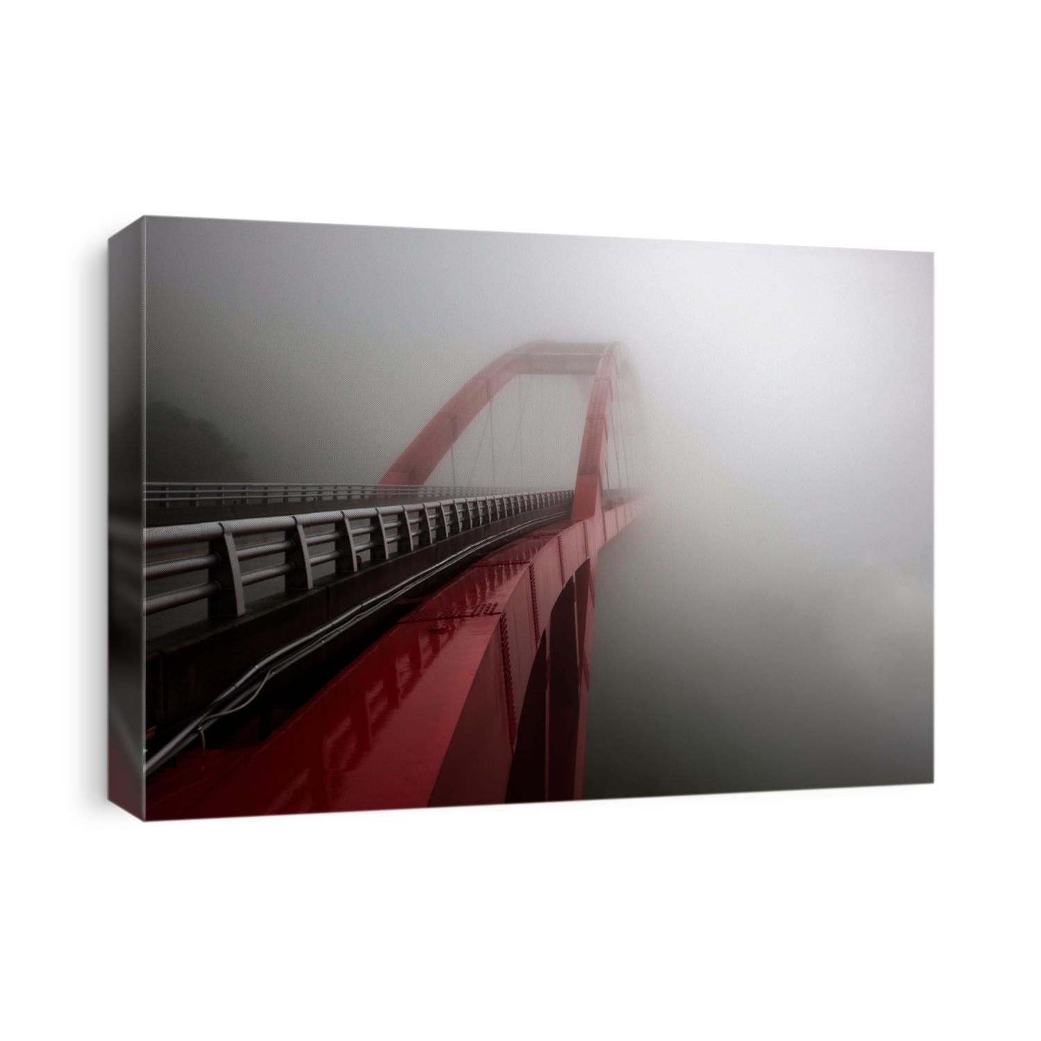 Traveling around the island of Taiwan in Asia. View from the road to a totally hazy modern metal red bridge and dangerous situation on the road. Foggy path, no visibility over the gulf on the road.
