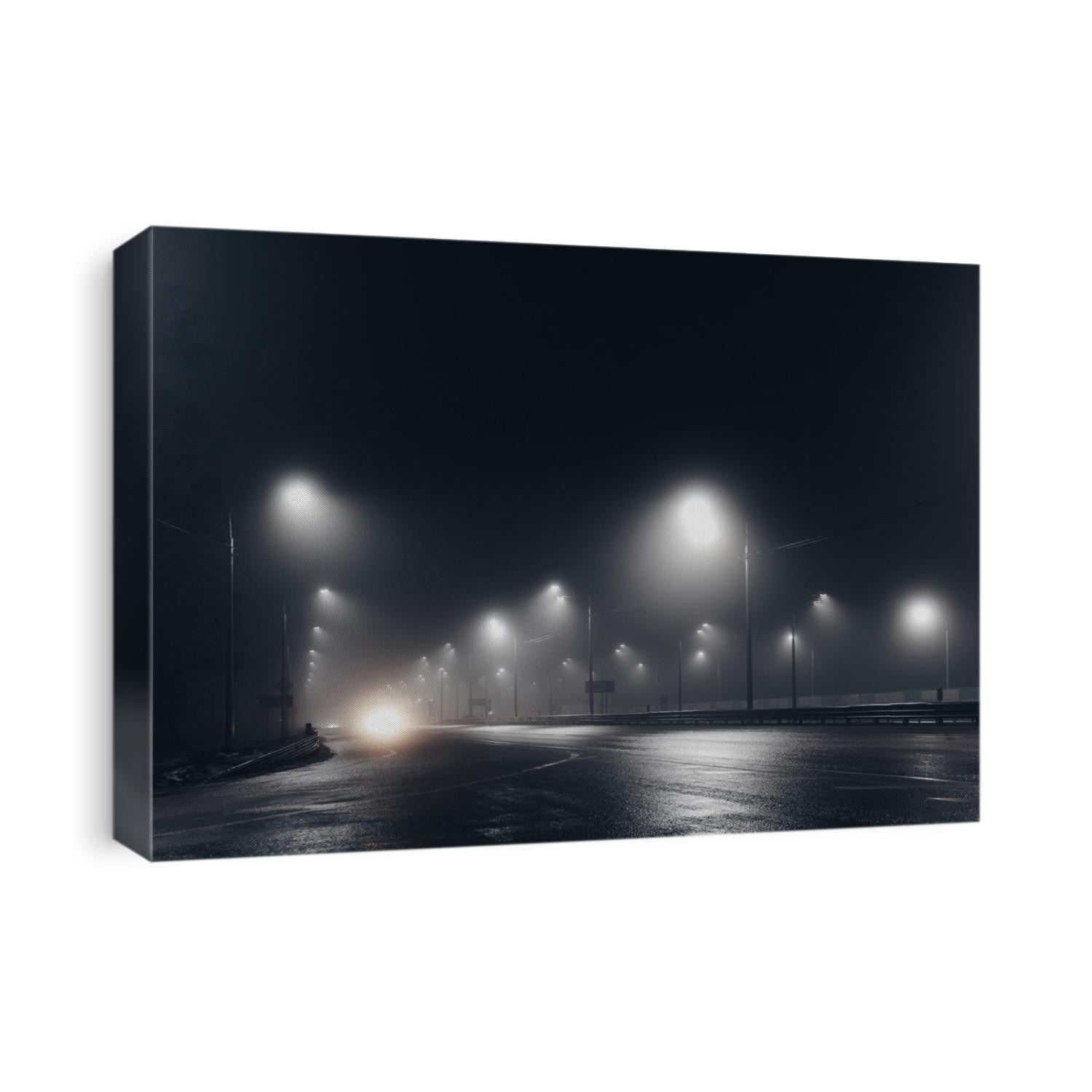 Foggy misty night road illuminated by street lights