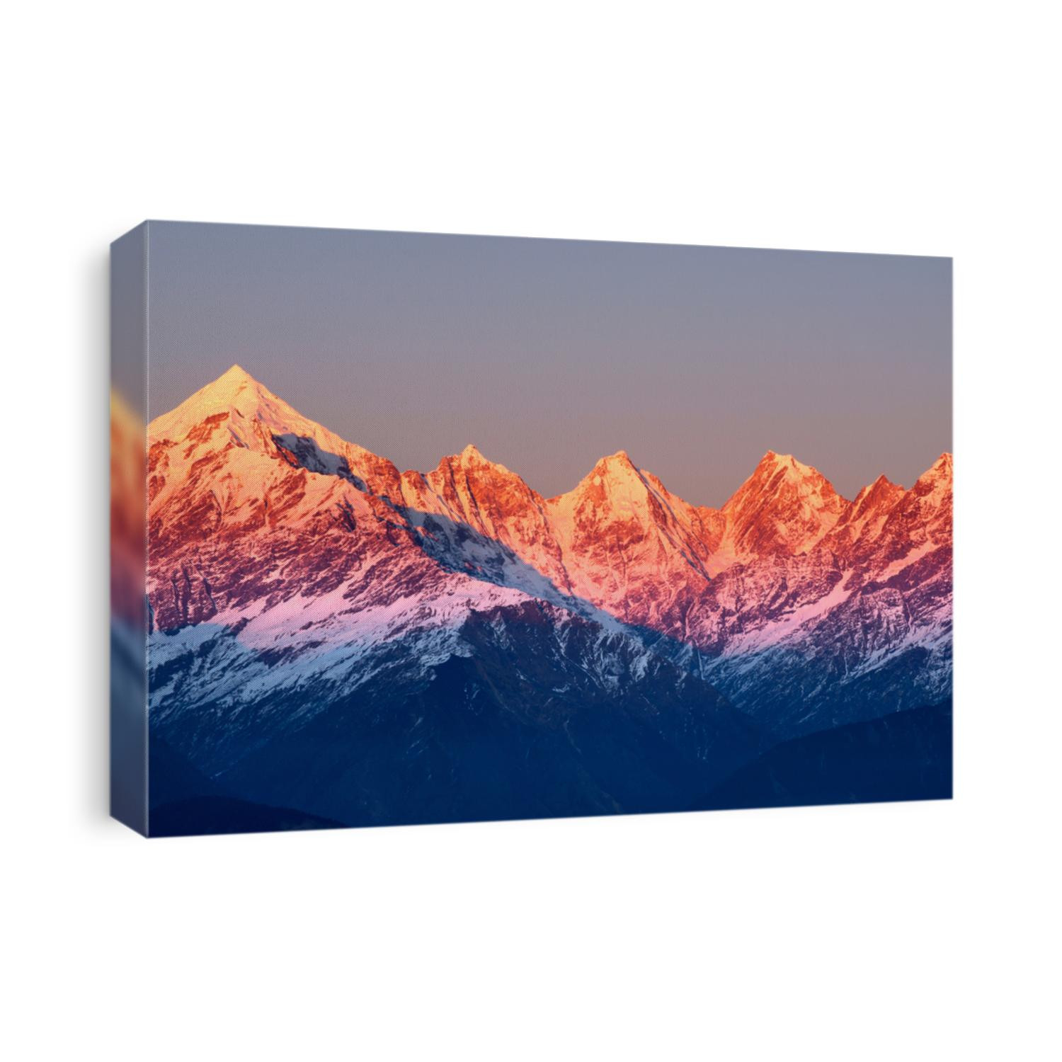 close shot of reddish mountain peaks during sun set
