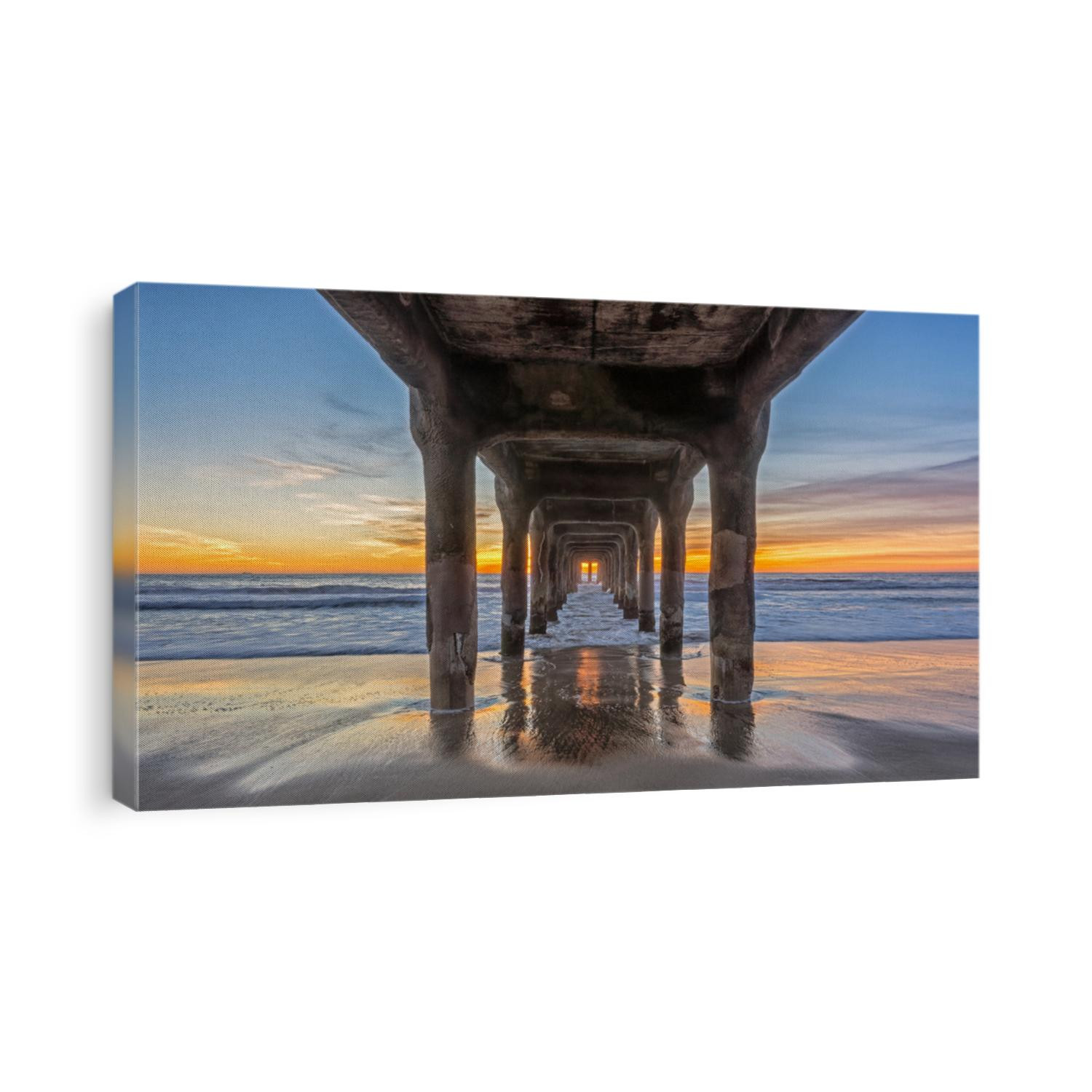 sun setting over manhattan beach,shot under its iconic pier,manhattan beach,california,2015