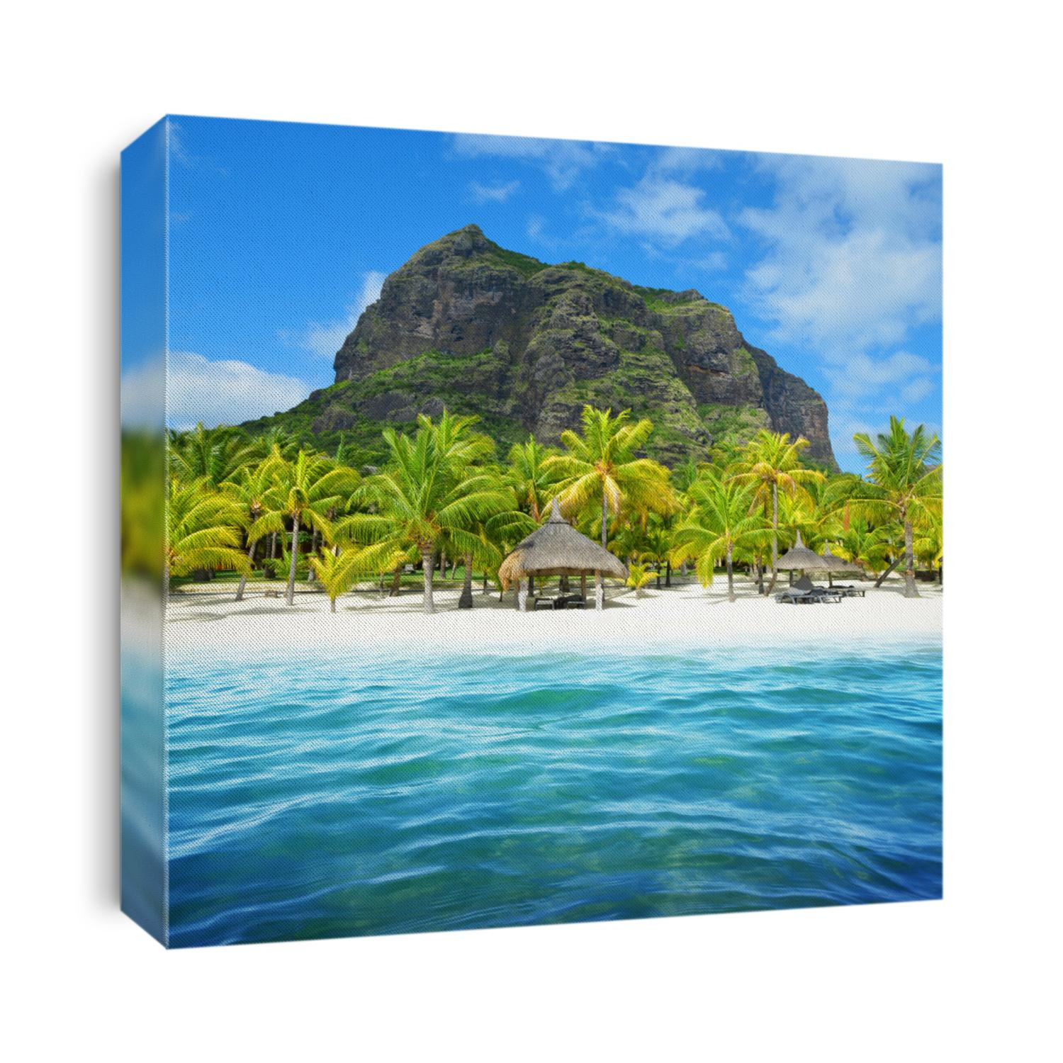 Beautiful sandy beach with Le Morne Brabant mountain on the south of Mauritius island. Tropical landscape.