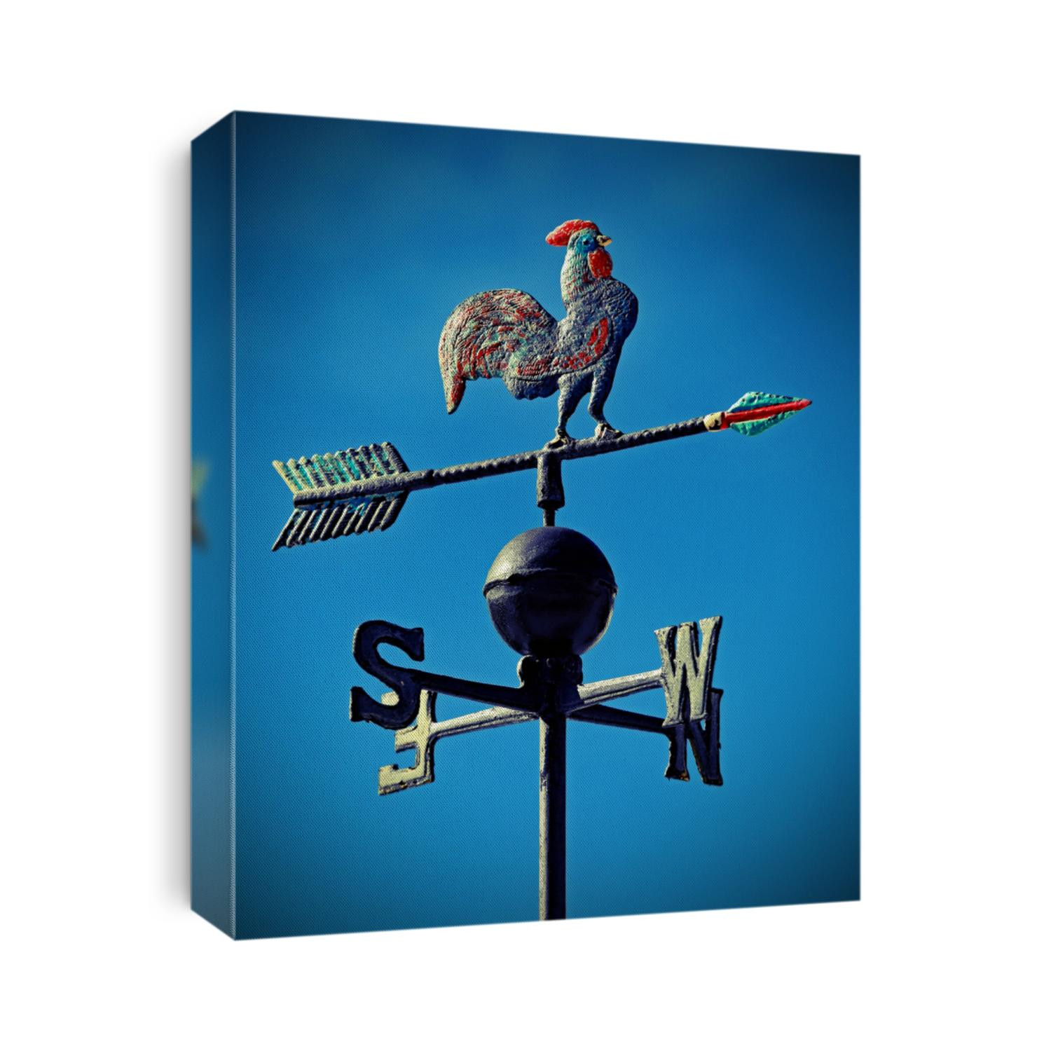 weather vane to indicate the wind direction with a rooster in wrought iron and arrows of Cardinal Points North East South West and old vintage effect