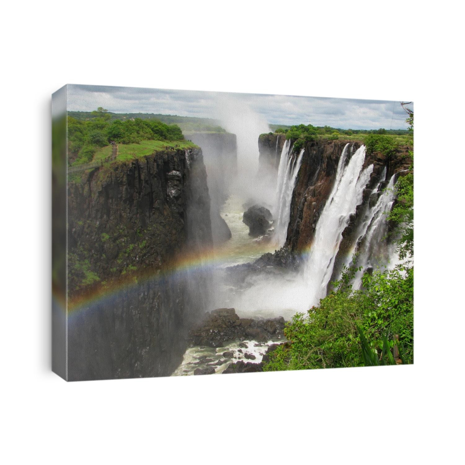 Rainbow over Victoria Falls on Zambezi River, border of Zambia and Zimbabwe