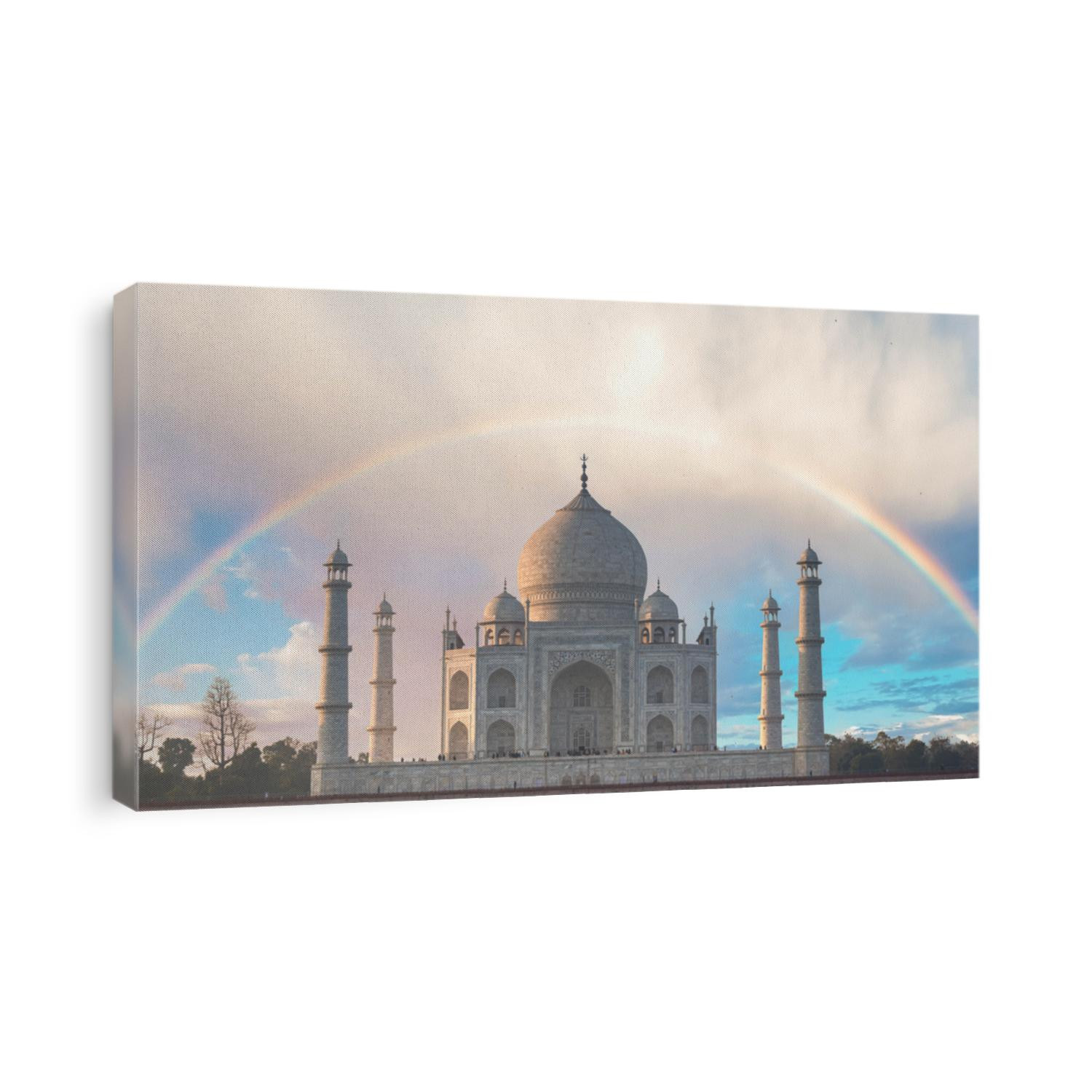 Rainbow over Taj Mahal is a UNESCO World heritage site and one of 7th Wonder of the World.view from Mehtab Bagh opposite bank of Yamuna river, in Agra city, Uttar Pradesh, India