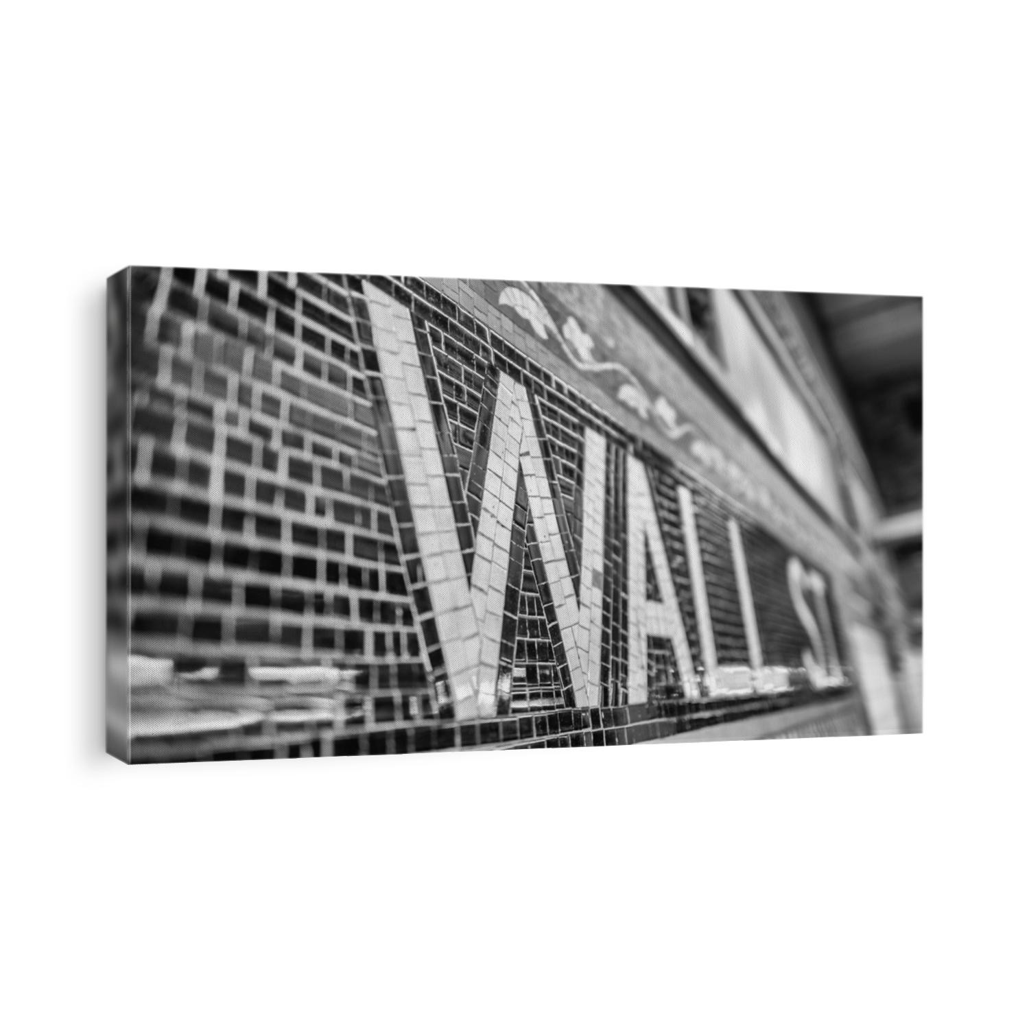 Wall Street sign inside a subway station, New York City.