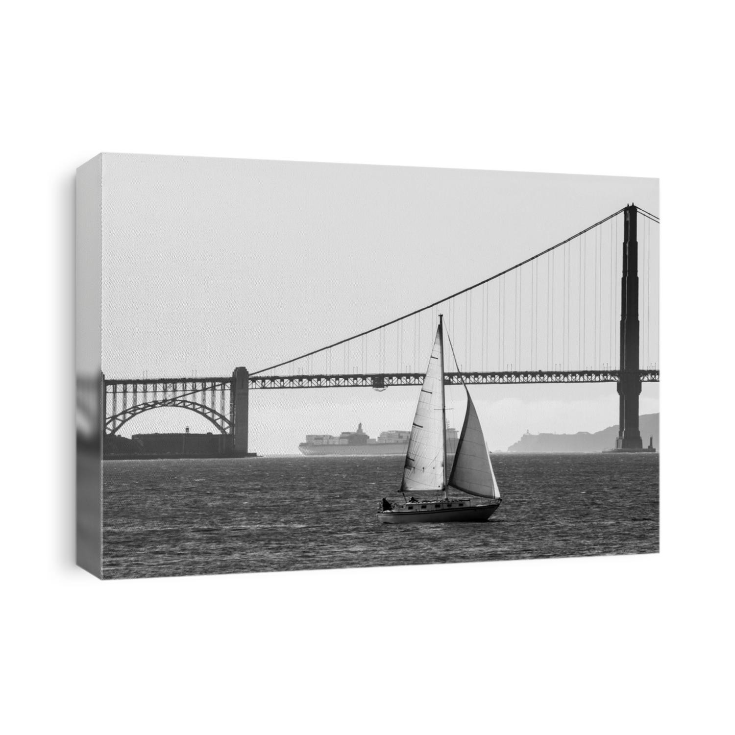 A yacht sails in San Francisco Bay near the Golden Gate Bridge in California, USA.