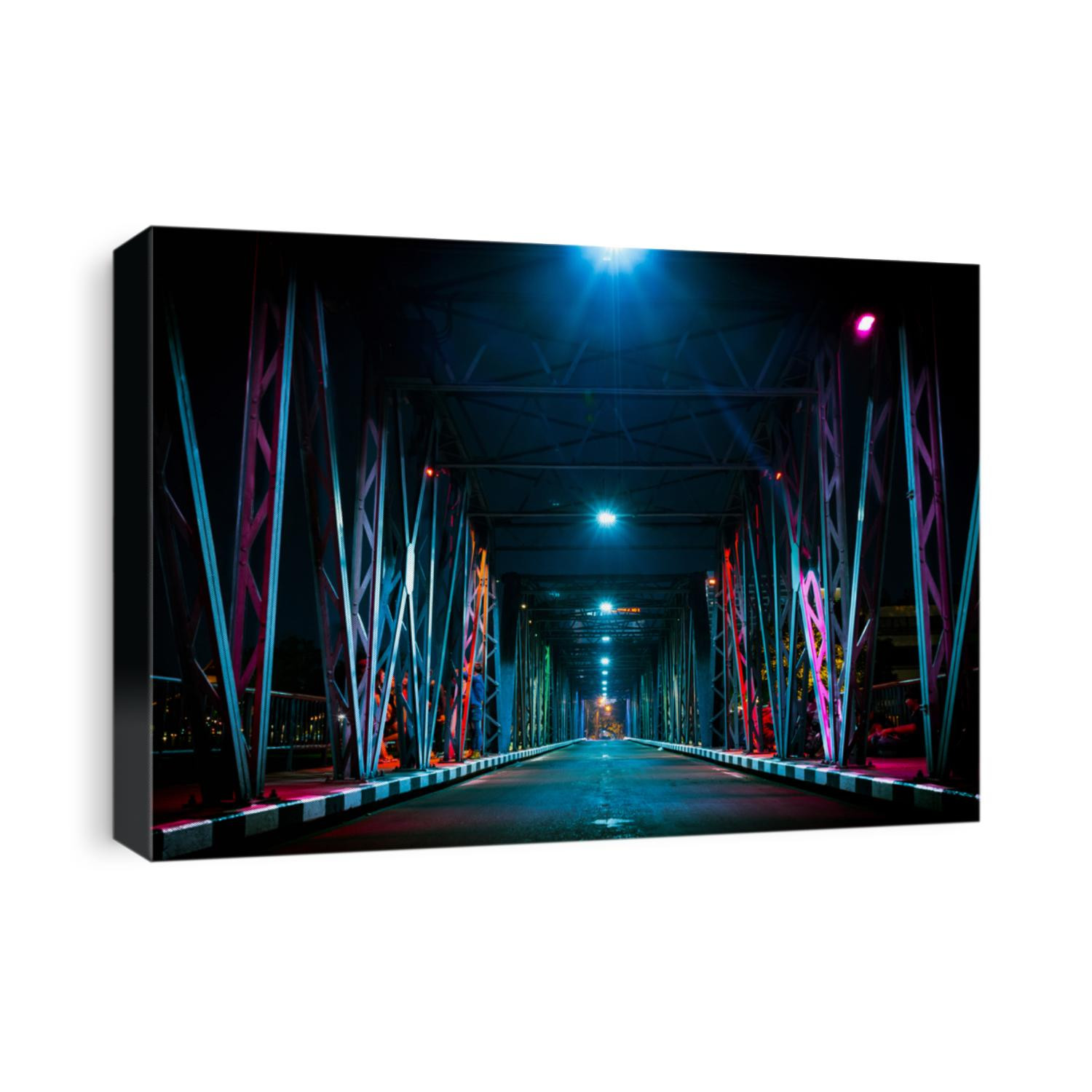 Colorful light on Iron Bridge at night time in Chiang mai, Thailand