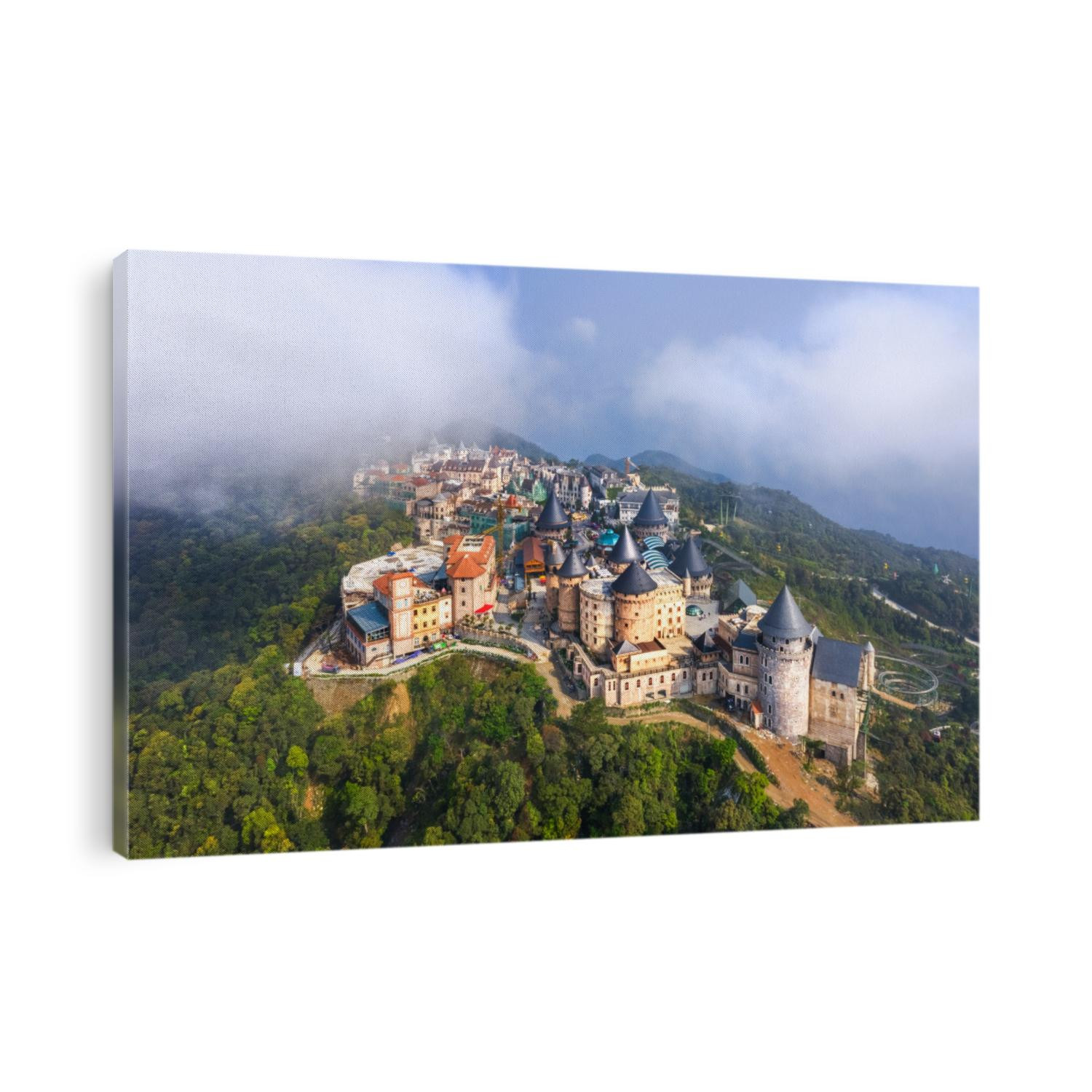 Aerial view of landscape is castles covered with fog at the top of Bana Hills, the famous tourist destination of Da Nang, Vietnam. Near Golden bridge.