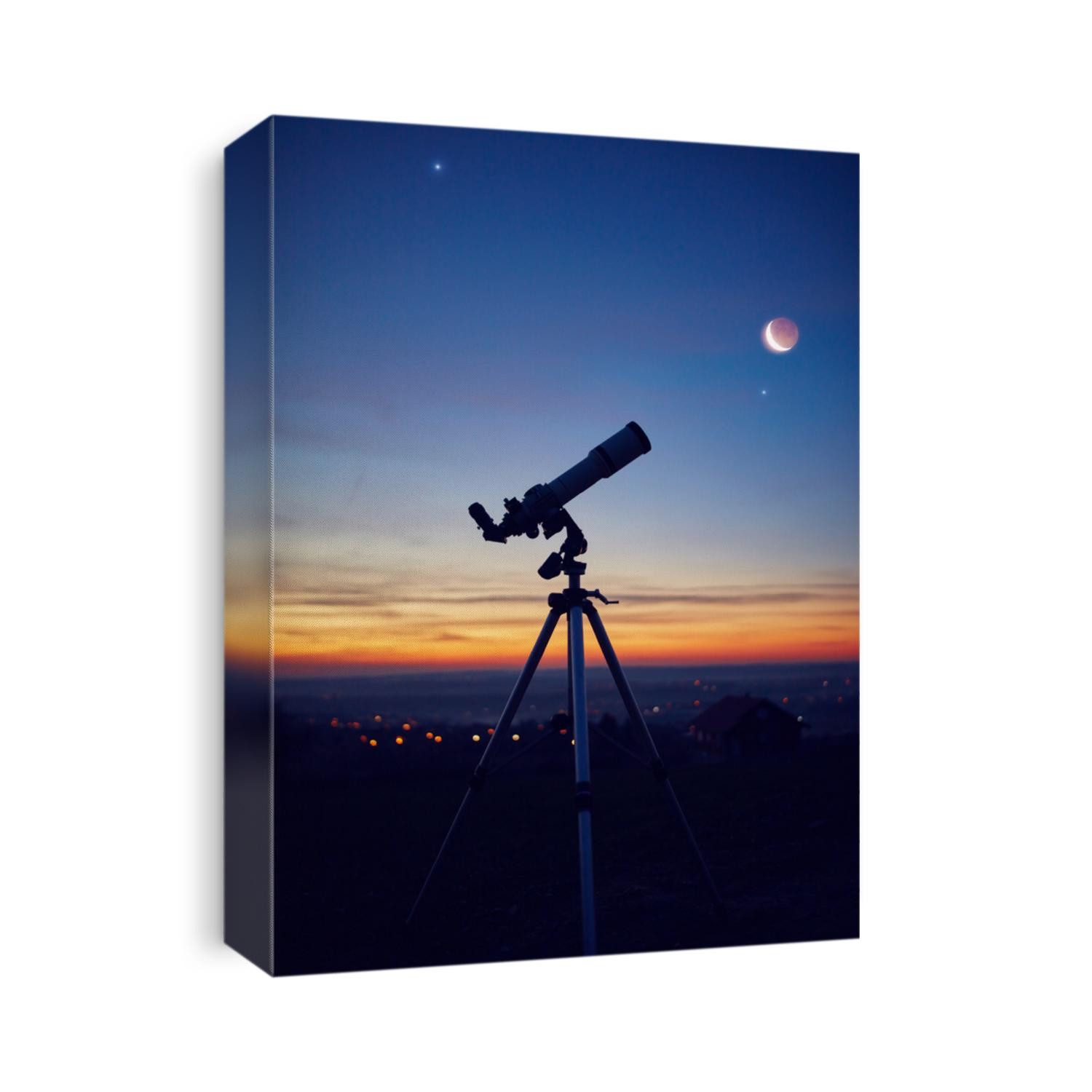 Silhouette of a astronomy telescope with twilight sky.