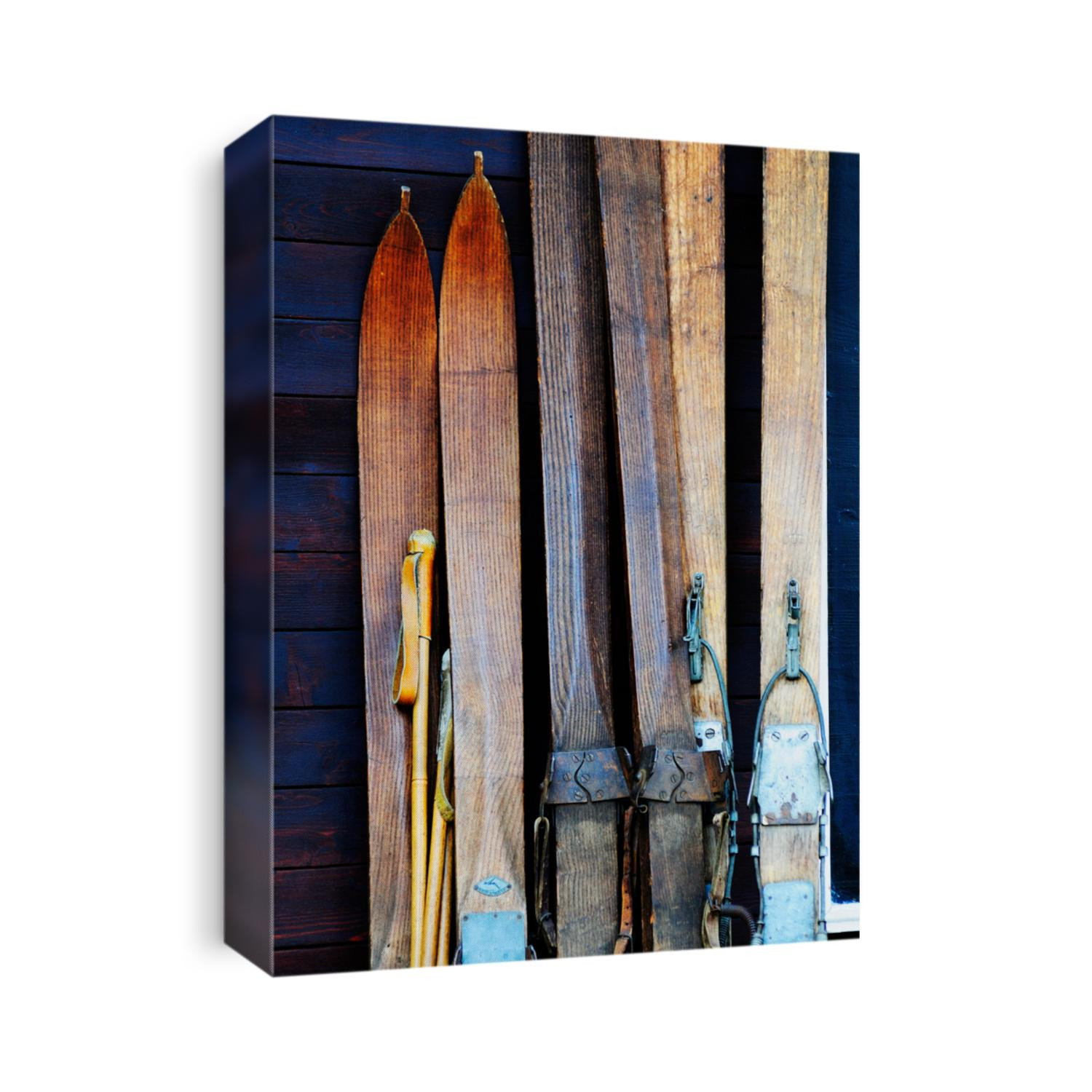 Three pairs of a 100-year old ski