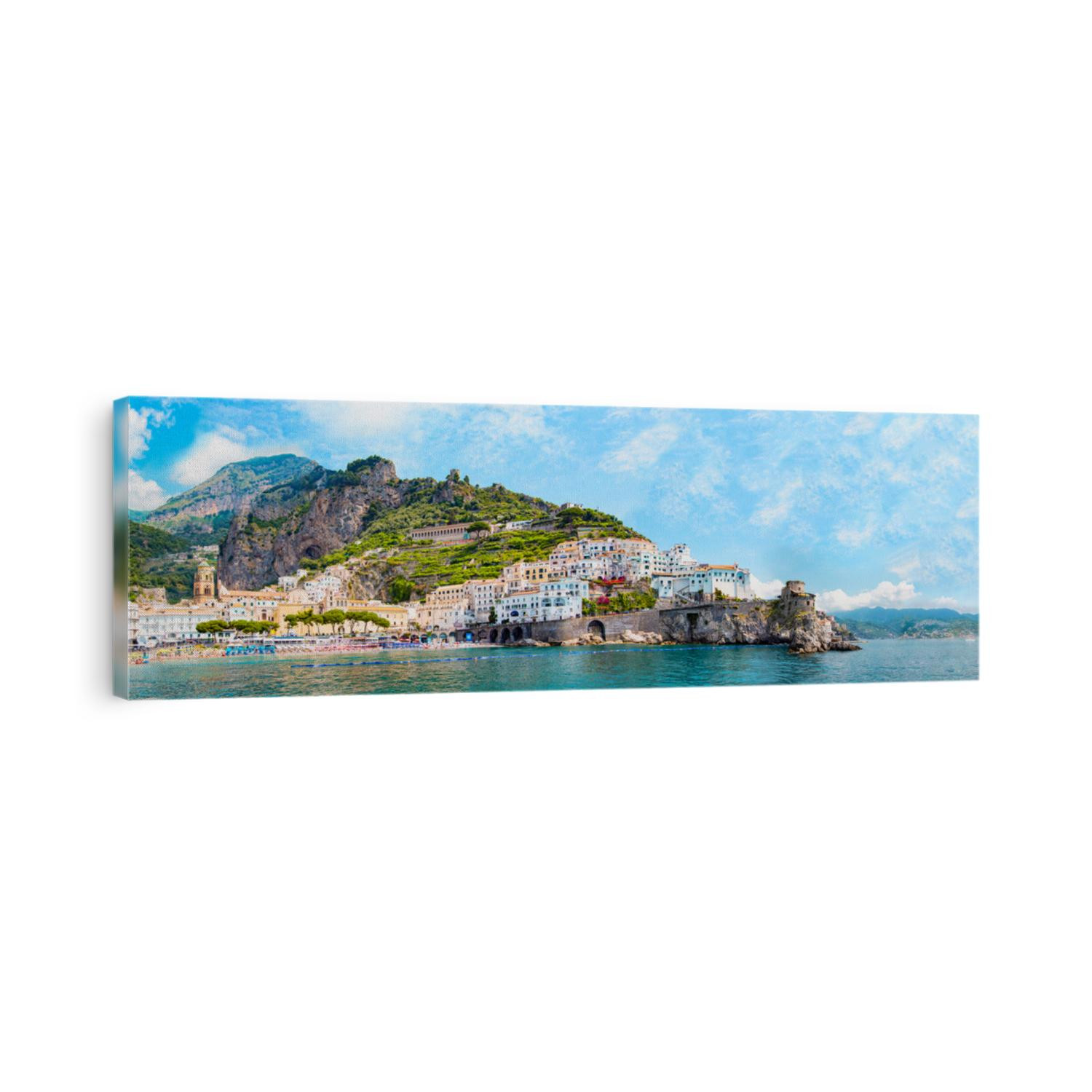 Panoramic view, aerial skyline of small haven of Amalfi village with tiny beach and colorful houses located on rock. Tops of mountains on Amalfi coast, Salerno, Campania, Italy.